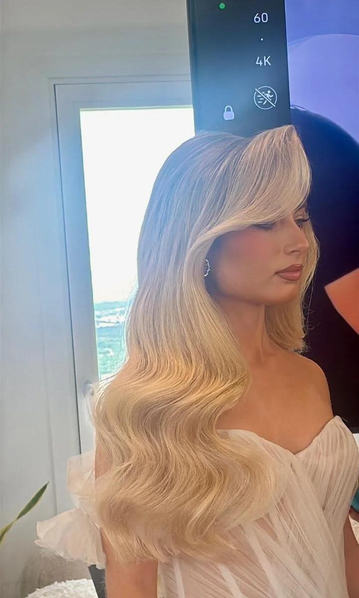 Soft blonde waves, natural glow bridal look
